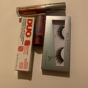 NWT 4-piece makeup set: lashes, brush lash adhesive lipstick, and eye shadow